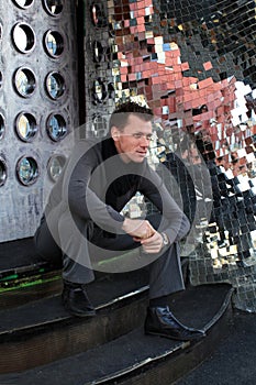 Man sitting on staircase