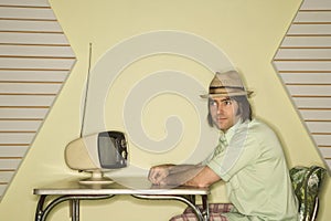 Man sitting at table.