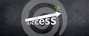 Man sitting on top of Success Arrow