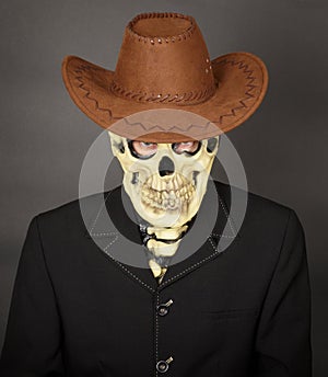 Man - skeleton in leather cowboy hat