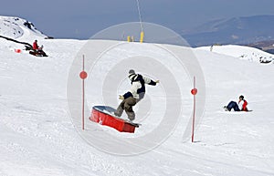 Man on ski slopes of Pradollano ski resort in Spain photo