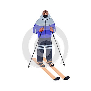 Man skier skiing on winter holiday. Active person standing, holding poles, sticks in hands. Character and outdoor sport