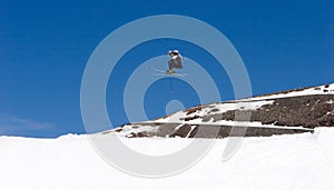 Man skiing on slopes of Pradollano ski resort in Spain