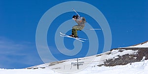 Man skiing on slopes of Pradollano ski resort in Spain