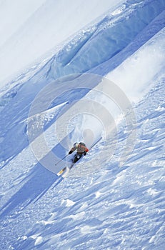 Man Skiing On Steep Slope