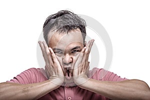 man slapping his cheeks - High contrast