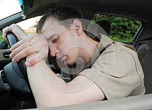 Man sleep in a car