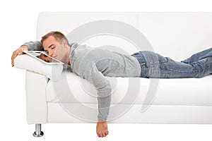 Man sleep with tablet PC