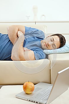 Man sleeping on couch