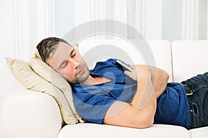 Man sleeping on couch
