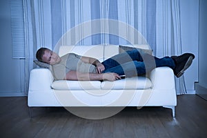 Man Sleeping On Couch photo