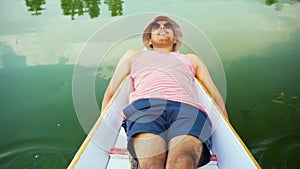 Man Sleeping in Dal Lake, Srinagar, Jammu and Kashmir, India