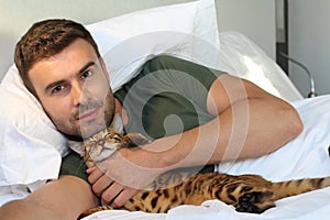 Man sleeping with his cat