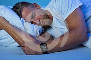 Man Sleeping With Smart Watch In His Hand