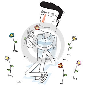 Man smells a flower at the flower garden