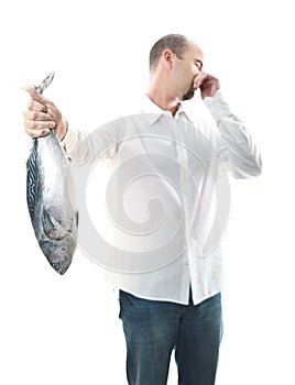 Man with smelly fish