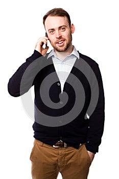 Man smiling as he chats on his mobile phone