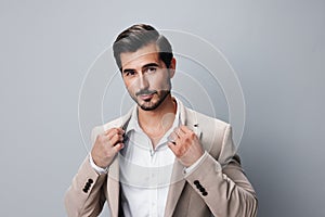 man smiling copyspace beige businessman suit business handsome happy job portrait