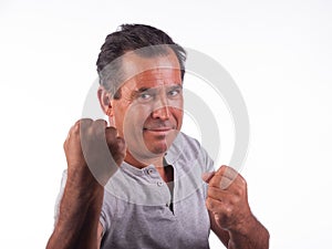 Man smiling infighting position