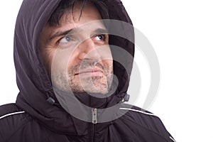 Man smiling in winter jacket on white background