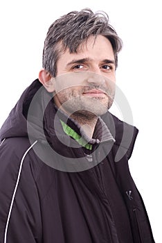 Man smiling in winter jacket on white background photo