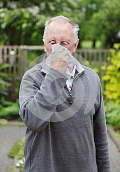 Man sneezing corona virus Coronavirus hayfever photo