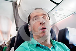 Man Snoring While Sleeping On Plane