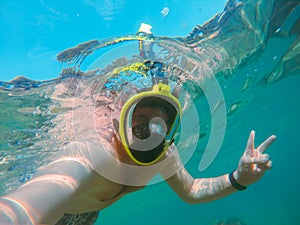 man with snorkeling mask underwater summer sea vacation