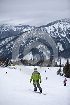 Man snowboarder portrait on ski slope