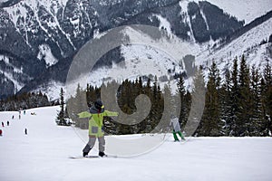 Man snowboarder portrait on ski slope