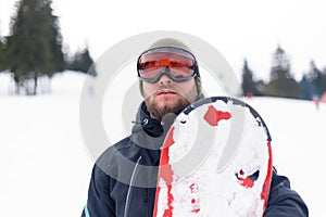 Man snowboarding in the mountains