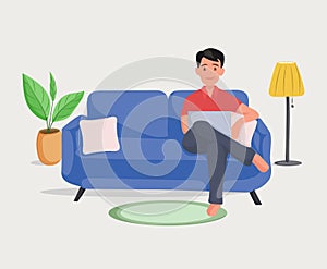 Man on the sofa with laptop. Businessman work at home. Freelancer