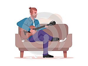 Man on sofa playing on string guitar compose songs