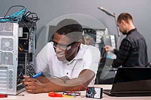 Man soldering electronics