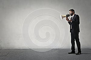 Man speaking into the megaphone