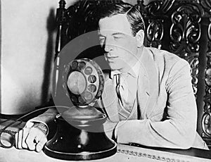 Man speaking into a microphone