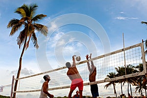Man Spikes Ball Past Blocker In Miami Beach Volleyball Game