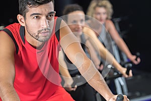 Man in spinning class at gym