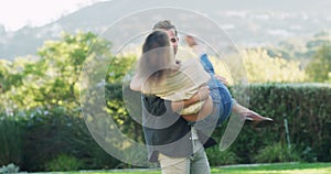 Man, spinning and woman outdoor for love celebration or marriage weekend, engagement or romance date. Happy partnership