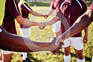 Man, sports and handshake for team introduction, greeting or sportsmanship on the grass field outdoors. Sport men