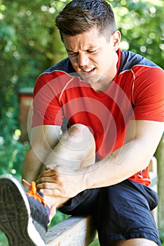 Man With Sports Injury Sustained Whilst Exercising Outdoors