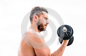 Man sportsman with strong hands. steroids. athletic body. Dumbbell gym. fitness and sport. Muscular man exercising in