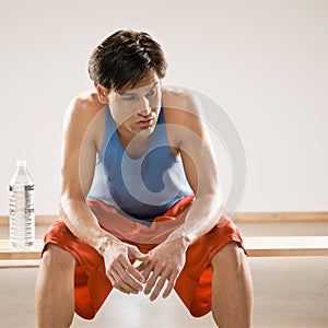 Man in sportswear relaxing after work out