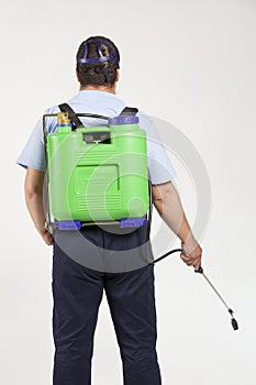 Man spraying insects- pest control