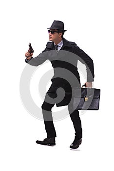 The man spy with handgun isolated on white background