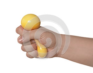 Man squeezing yellow stress ball on white background, closeup