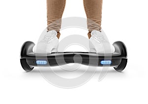 Man stand on black hover board isolated. photo