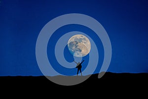Man stand at full moon
