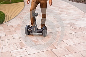 man stand near segway hoverboard