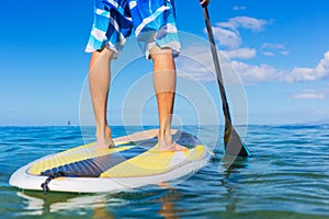 Man on Stand Up Paddle Board